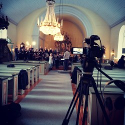 Repetetition med Stavnäs-Högeruds kyrkokör och Arvika Stråkorkester. Foto: David Fryxelius.