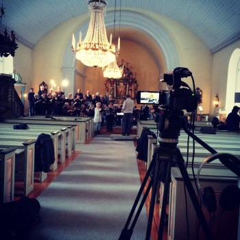 Repetetition med Stavnäs-Högeruds kyrkokör och Arvika Stråkorkester. Foto: David Fryxelius.